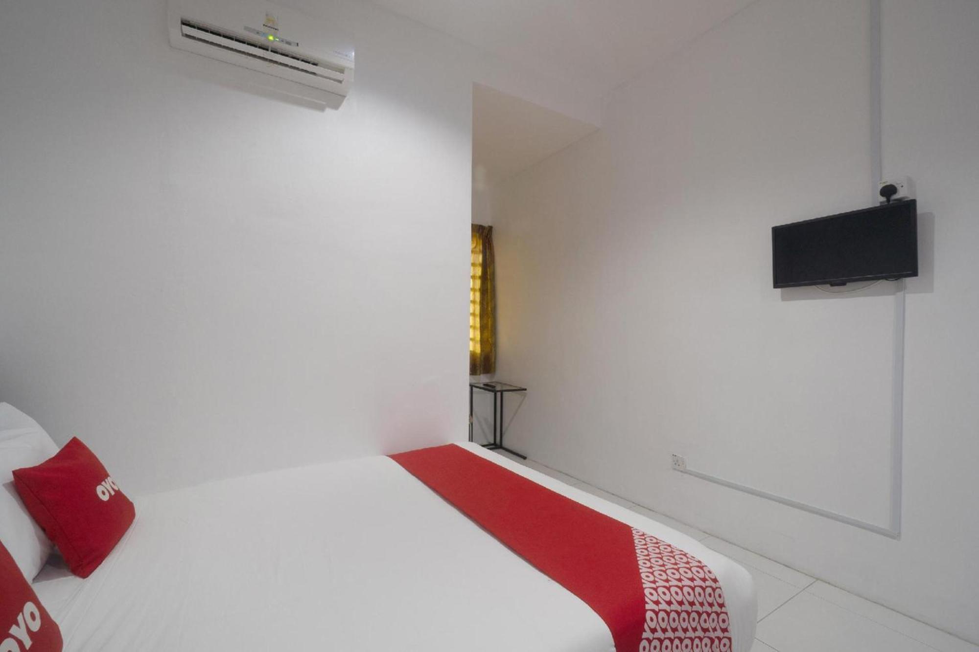 Oyo 91089 Motel Fasa 2B Сери Манджунг Екстериор снимка