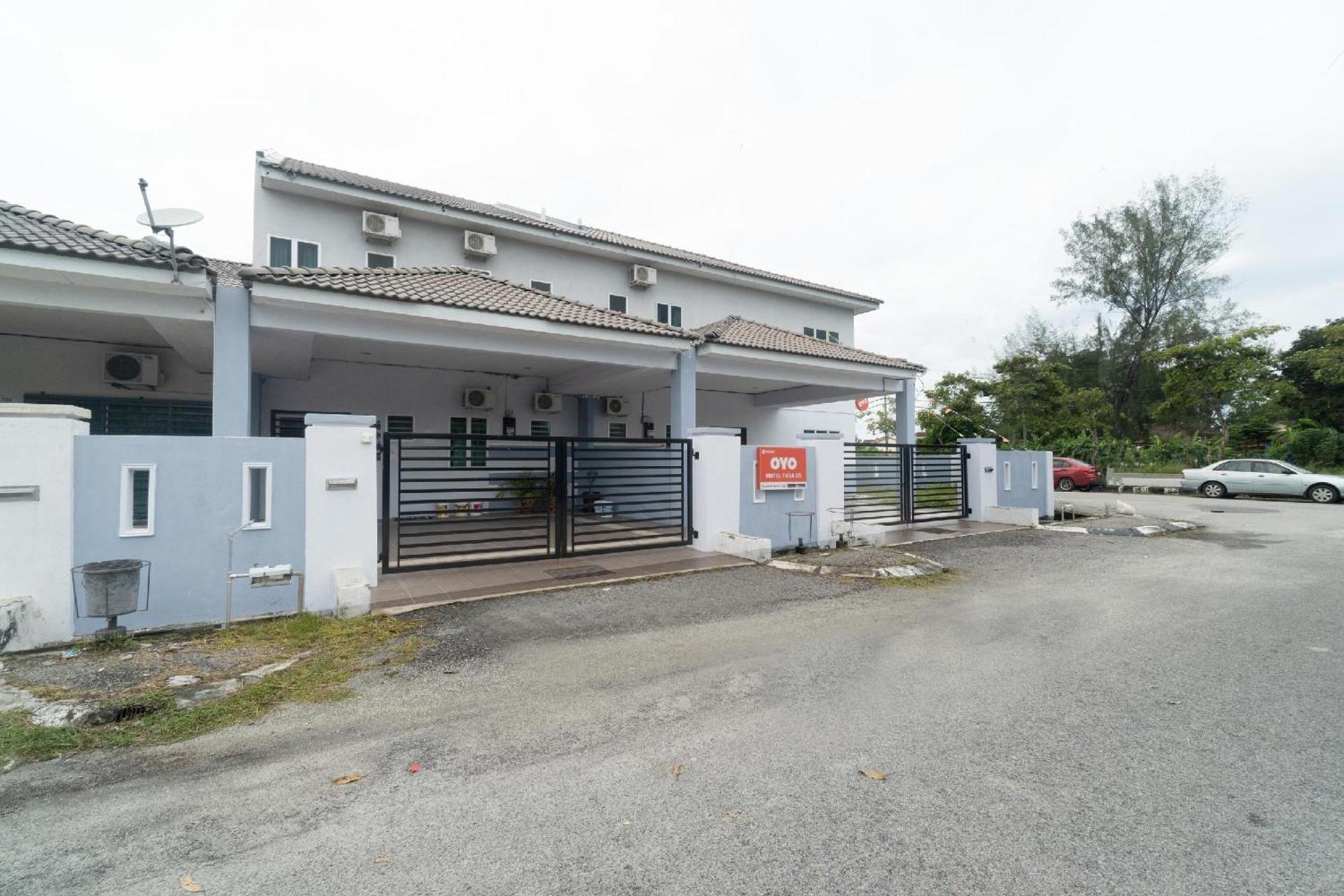 Oyo 91089 Motel Fasa 2B Сери Манджунг Екстериор снимка